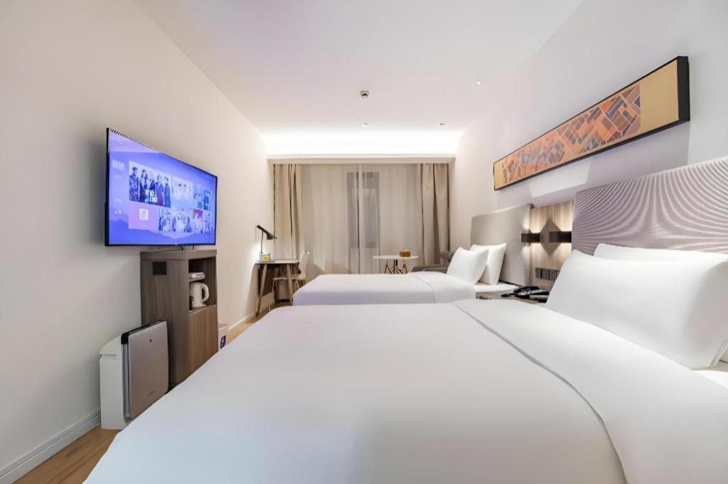 Hanting Hotel Shanghai Caohejing Yishan Road Bagian luar foto